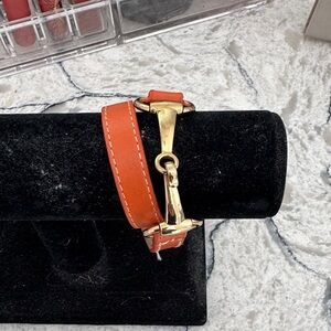 Elegant Orange Leather Bracelet with Gold Accents